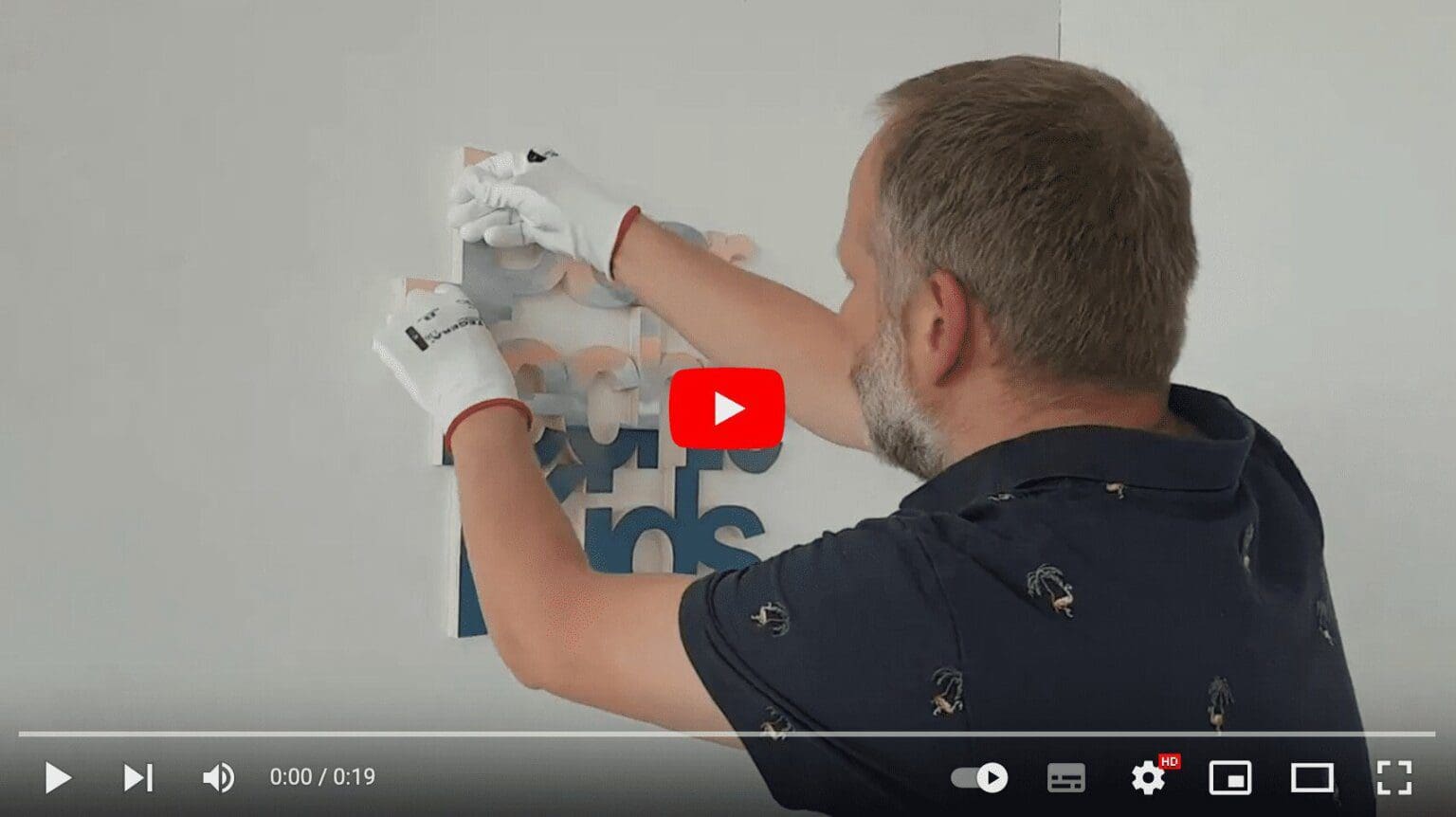 Videoinstructie hoe het werk op te hangen met dubbelzijdig tape
